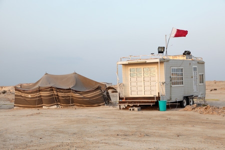 Bedoiun tent and a trailer at the Gulf coast in Qatarの写真素材