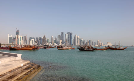 Skyline of the new Doha downtown. Dhow harbour in the foreground. Doha, Qatar, Middle East