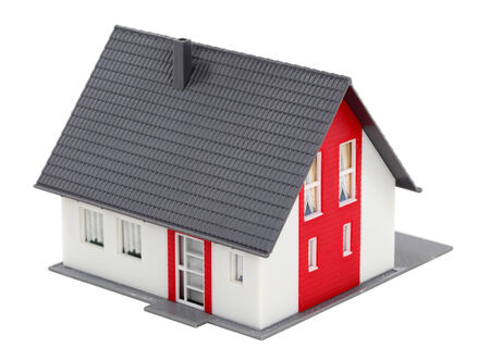 Model of a house isolated over white backgroundの写真素材