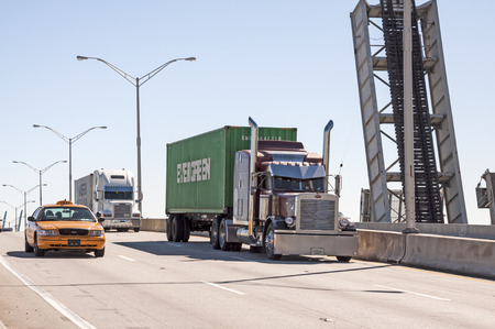 Trucks on the bridge in Miami, Florida, USA