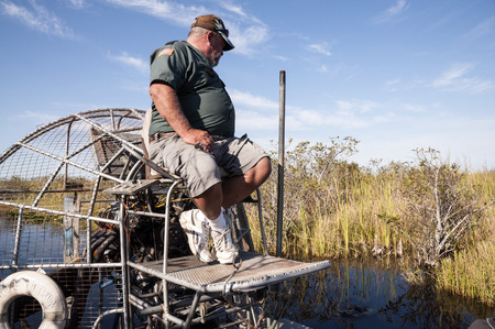 Airboat driver in the everglades national park, Florida, USA