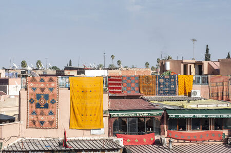 MARRAKESH, MOROCCO - NOV 20: Colorful berber carpets for sale at the Jemaa el-Fnaa square in...