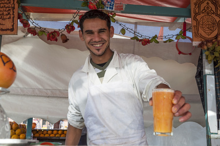 MARRAKESH, MOROCCO - NOV 22: Juice vendor at Djema el Fna square in Marrakesh. November 22, 2008 in Marrakesh, Moroccoのeditorial素材