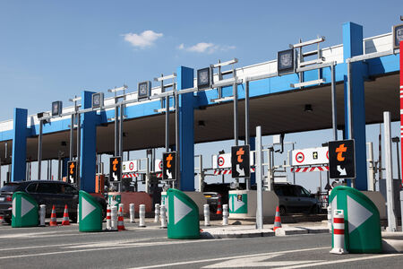 PARIS, FRANCE - JULY 3, 2014: Drivers pay road toll for using the highway A10. July 3, 2014 in Paris, France.のeditorial素材