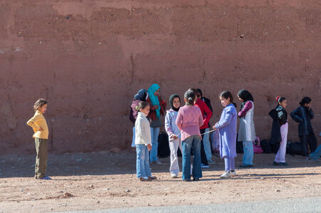 Moroccan school kids waiting for the bus. Marrakesh, Moroccoのeditorial素材
