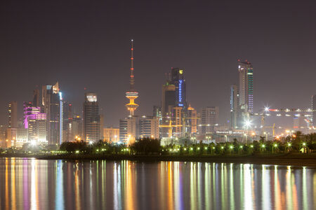 Skyline of Kuwait City illuminated at night. December 8, 2014 in Kuwait, Middle Eastのeditorial素材