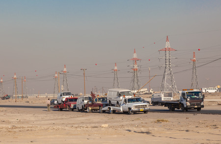 Old american GMC wrecking trucks still in use in Kuwait. December 9, 2014 in Kuwait, Middle Eastのeditorial素材
