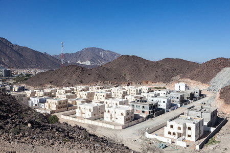 New residential buildings in Khor Fakkan, Fujairah, United Arab Emiratesのeditorial素材