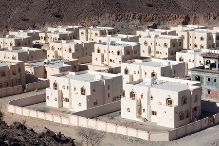 New residential buildings in Khor Fakkan, Fujairah, United Arab Emiratesのeditorial素材