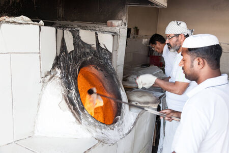 AJMAN, UAE - DEC 17: Traditional arabian bakery shop in Ajman. December 17, 2014 in Ajman, United Arab Emiratesのeditorial素材