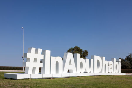 ABU DHABI - DEC 19: #InAbuDhabi twitter hashtag sculpture at the Airport of Abu Dhabi. December 19, 2014 in Abu Dhabi, United Arab Emiratesのeditorial素材