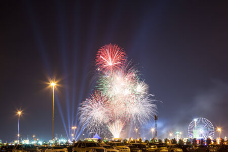 DUBAI, UAE - DEC 19: Fireworks at the Dubai Global Village. December 19, 2014 in Dubai, United Arab Emiratesのeditorial素材