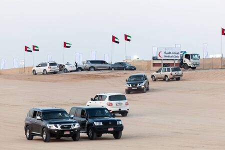 MADINAT ZAYED, UAE - DEC 22: Emirati people in their cars at Al Dhafra Camel Festival in Al Gharbia. December 22, 2014 in Madinat Zayed, Emirate of Abu Dhabi, UAEのeditorial素材