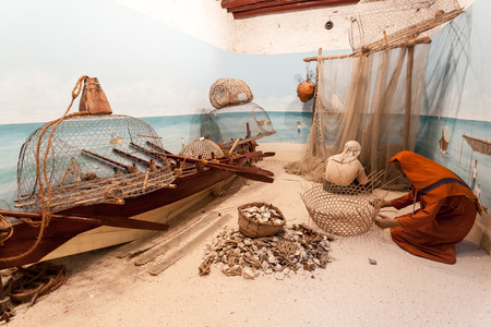 AJMAN, UAE - DEC 17: Scenery with bedouin fishermen in the museum of Ajman. December 17, 2014 in Ajaman, United Arab Emiratesのeditorial素材