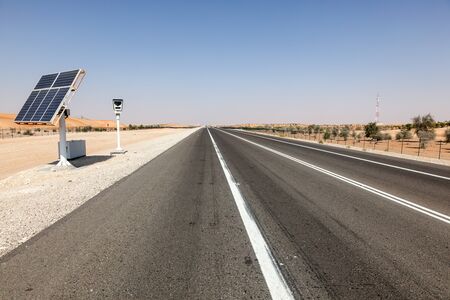 Solar powered speed control camera on the highway in Abu Dhabi, United Arab Emiratesの写真素材