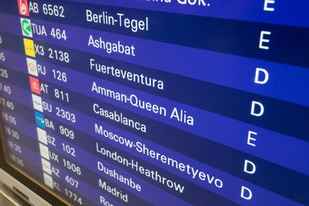 FRANKFURT MAIN - DEC 6: Departure board with destination airports in Frankfurt Main. December 6, 2014 in Frankfurt Main, Germanyのeditorial素材