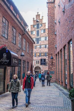 BREMEN, GERMANY - APR 5: Tourists in historic Boettcher Street in the old town of Bremen. April 5,...