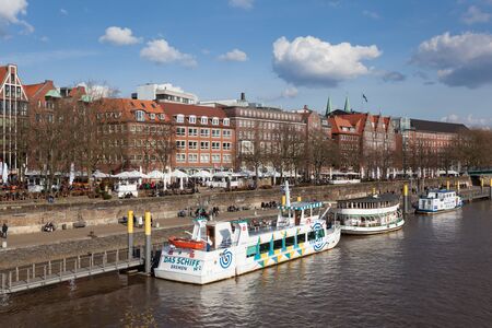 BREMEN, GERMANY - APR 5: Waterfront promenade at the Weser river in Bremen. April 5, 2015 in Bremen, Germanyのeditorial素材