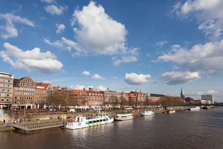 BREMEN, GERMANY - APR 5: Waterfront buildings at the Weser river in Bremen. April 5, 2015 in Bremen, Germanyのeditorial素材