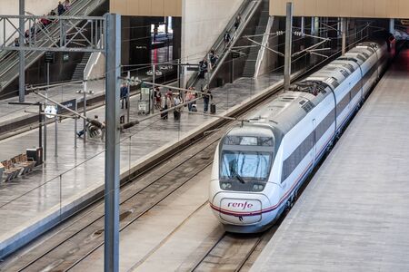 ZARAGOZA, SPAIN - MAY 26: Passenger train in Zaragoza Delicias - the main train station in Zaragoza. May 26, 2015 in Zaragoza, Spainのeditorial素材