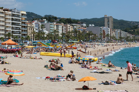 LLORET DE MAR, SPAIN - MAY 27: Beautiful beach in mediterranean resort Lloret de Mar. May 27, 2015 in Lloret de Mar, Catalonia, Spainのeditorial素材