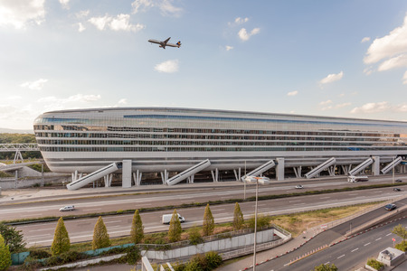 FRANKFURT, GERMANY - JULY 21: Futuristic office building with a train station in the underground at the Frankfurt International Airport (FRA). July 21, 2015 in Frankfurt Main, Germanyのeditorial素材