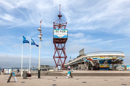 SCHEVENINGEN, NETHERLANDS - AUG 10: View over The Pier from the promenade in Scheveningen. August 10, 2015 in Scheveningen, Netherlandsのeditorial素材