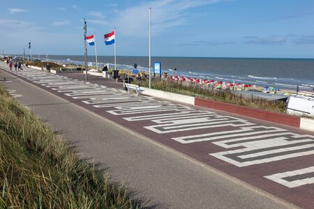 ZANDVOORT, NETHERLANDS - AUG 8: Promenade on top of a dyke in Zandvoort, North Holland. August 8, 2015 in Zandvoort, Netherlandsのeditorial素材