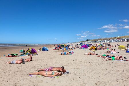 ZANDVOORT, NETHERLANDS - AUG 8: People relaxing on the North Sea beach in Holland. August 8, 2015 in Zandvoort, North Holland, Netherlandsのeditorial素材