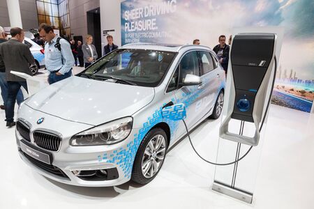 FRANKFURT, GERMANY - SEP 22: Presentation of the new BMW 225xe luxruy hybrid car at the BMW booth of the IAA International Motor Show 2015. September 22, 2015 in Frankfurt Main, Germanyのeditorial素材