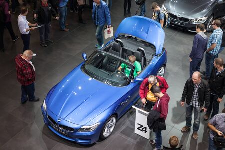 FRANKFURT, GERMANY - SEP 22: Visitors are watching the BMW Z4 sports car at the IAA International...