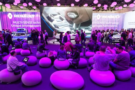 FRANKFURT, GERMANY - SEP 22: Visitors at the Renault booth at the IAA International Motor Show 2015. September 22, 2015 in Frankfurt Main, Germanyのeditorial素材