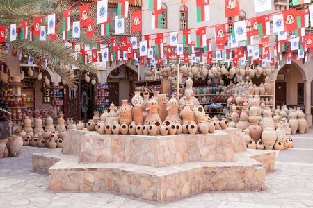 NIZWA, OMAN - NOV 25: Terracotta and ceramic pottery at the Nizwa souk. November 25, 2015 in Nizwa, Sultanate of Oman, Middle Eastのeditorial素材