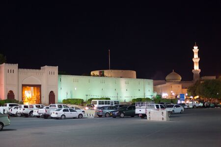 NIZWA, OMAN - NOV 25: Gate to the old town of Nizwa illuminated at night. November 25, 2015 in Nizwa, Sultanate of Oman, Middle Eastのeditorial素材