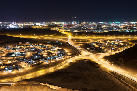 View over the city of Muscat at night. Sultanate of Oman, Middle Eastの写真素材