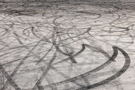 Tyre marks on an asphalt surfaceの写真素材