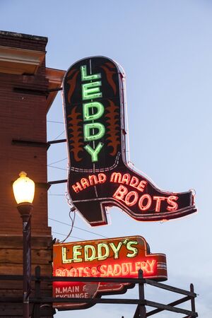 FORT WORTH, TX, USA - APR 6: Leddy Hand Made Boots shop in the Fort Worth Stockyards district illuminated at dusk. April 6, 2016 in Fort Worth, Texas, USA