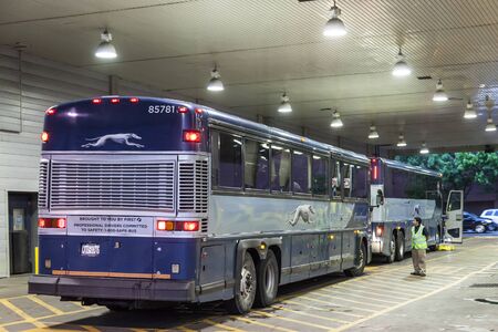 DALLAS, USA - APR 9: Greyhound buses at the terminal in Dallas downtown. April 9, 2016 in Dallas, Texas, United Statesのeditorial素材