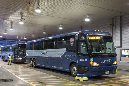 DALLAS, USA - APR 9: Greyhound buses at the terminal in Dallas downtown. April 9, 2016 in Dallas, Texas, United Statesのeditorial素材