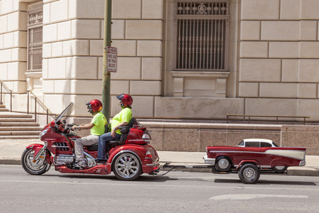 SAN ANTONIO, USA - APR 11: Couple on the Honda Goldwing trike with a trailer. April 11, 2016 in San...