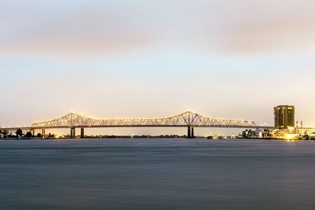 Crescent City Connection bridge in New Orleans illuminated at night. Louisiana, United Statesの写真素材