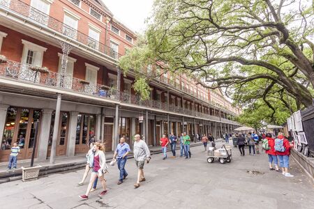 NEW ORLEANS, LA, USA - APR 16, 2016: Street scenery in the traditional French Quarter in the city of New Orleans. Louisiana, United Statesのeditorial素材
