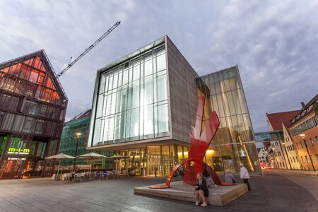 ULM, GERMANY - AUG 17, 2016: Modern art museum Kusthalle Weishaupt illuminated at night. City of Ulm, Baden Wurtemberg, Germanyのeditorial素材