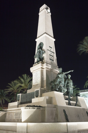 CARTAGENA, SPAIN -  OCT 22, 2016: Monument column in the city of Cartagena illuminated at night. Region of Murcia, Spainのeditorial素材