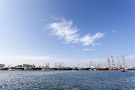 Dhow harbor and docks at the Sharjah Creek, United Arab Emirates, Middle Eastの写真素材