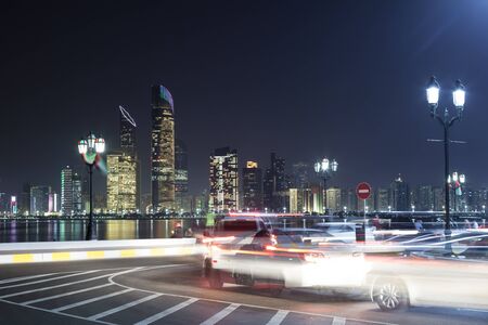 Traffic on the corniche of Abu Dhabi at night. United Arab Emirates, Middle Eastの写真素材