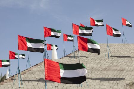 Many national flags of the UAE to celebrate the 45th National Day in Mezairaa, Emirate of Abu Dhabi, United Arab Emiratesの写真素材