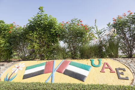 UAE national flags monument in a roundabout in Liwa Oasis. Emirate of Abu Dhabi, United Arab Emirates, Middle Eastのeditorial素材