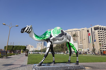 DUBAI, UAE - DEC 6, 2016: Colorful camel statue at the Dubai Creek in Deira. Dubai, United Arab Emirates, Middle Easのeditorial素材