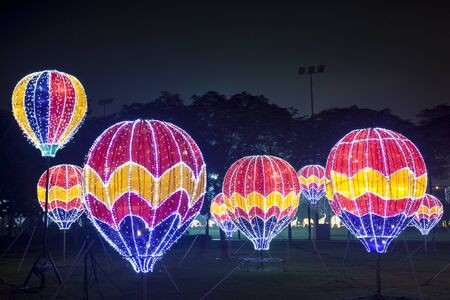 DUBAI, UAE - DEC 6, 2016: Glowing hot-air balloons at the Dubai Garden Glow family theme park illuminated at night. United Arab Emirates, Middle Eastのeditorial素材